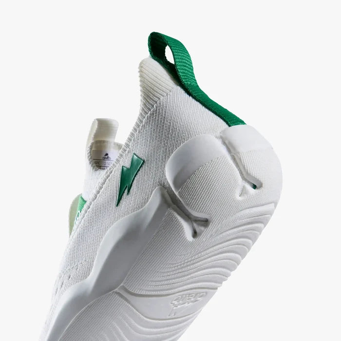 Macro close-up of the heel and outsole of an Aretto shoe, detailing the patented, flexible Y-shaped Supergrooves sole technology. (Sizes S3 & S4)